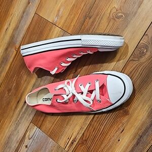 Neon pink Converse shoes